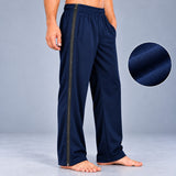 HAXOR navy blue tear away pants with full-length side zipper and soft fabric