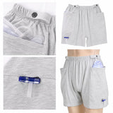 HAXOR catheter drainage bag shorts with dual 2000ml storage pockets, waistband tube holder and bottom drain valve opening for nephrostomy, ostomy and urostomy care.
