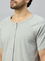 Close-up of a men's grey front-open recovery T-shirt with easy Velcro closure around the neck.