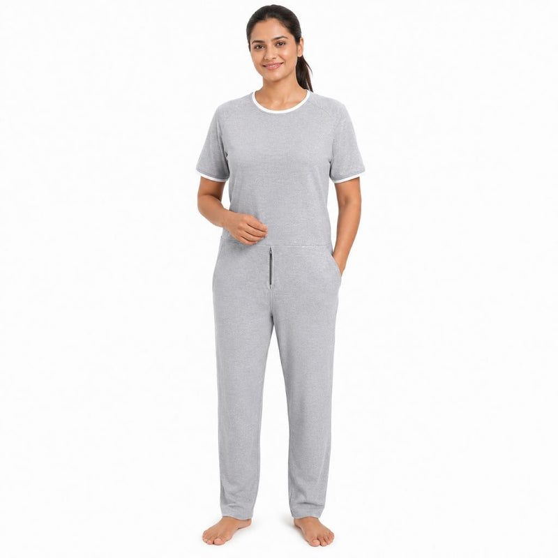 Women's adaptive jumpsuit front view with threaded round neck, front zip, back zip and soft breathable fabric
