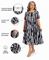 HAXOR Women's Self Dressing Duster House Dress in black and white print with square neckline, elastic cuffs, and two side pockets